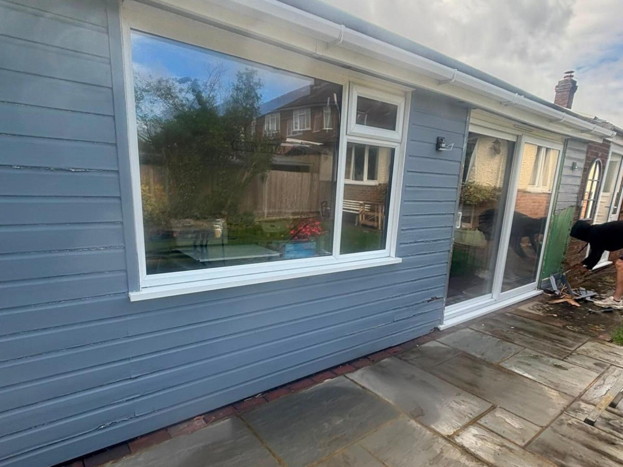 M3 Luton Garden Room Cladding Before and During Image 1